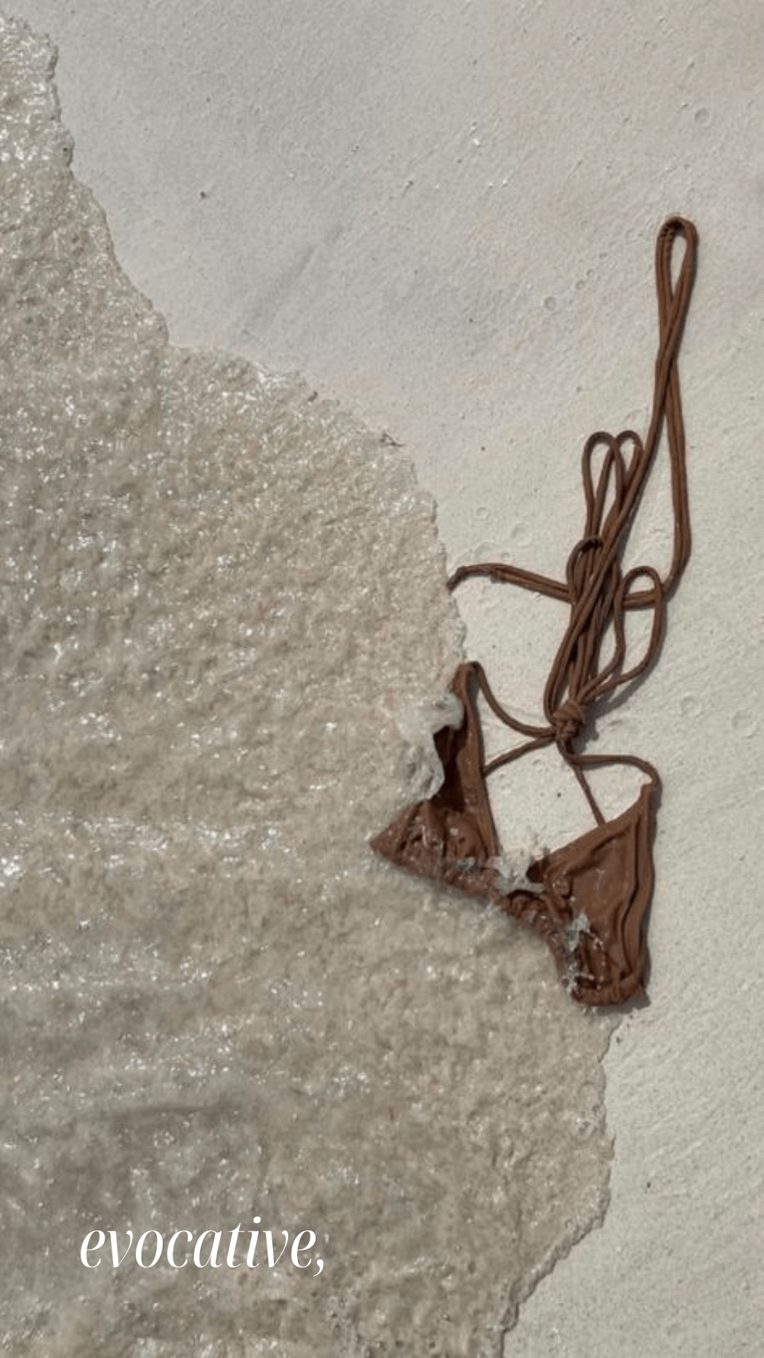 Bikini top with waves on the beach